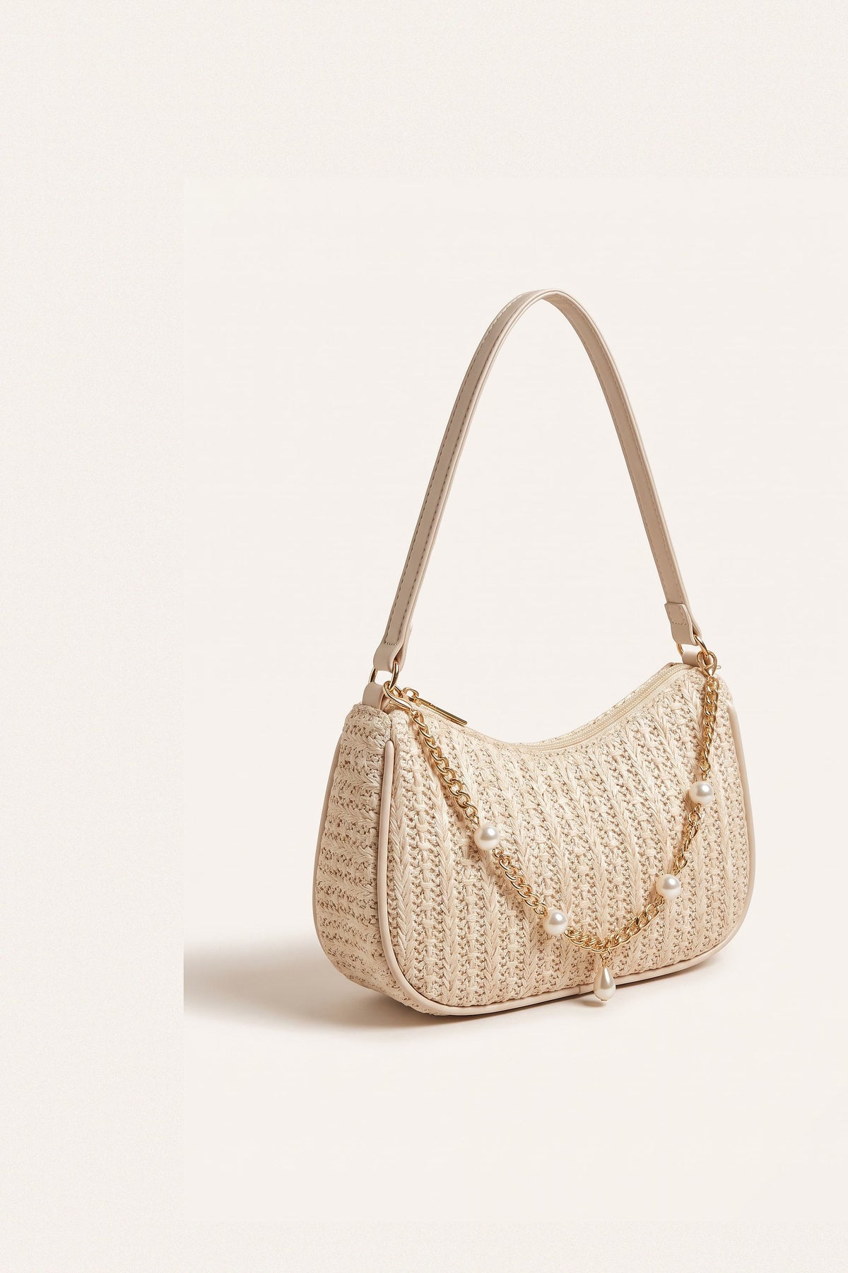 Florence shoulder bag in beige — three-quarter view