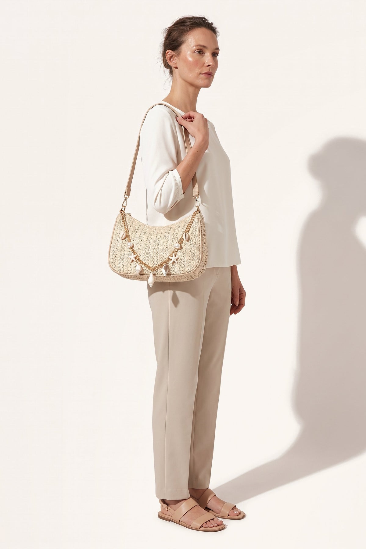 Florence shoulder bag in beige — on model