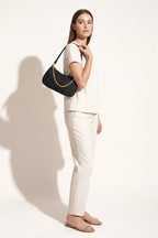 Florence shoulder bag in black — on model