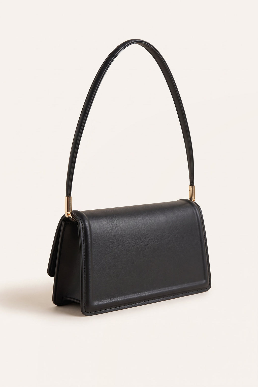 Harriet shoulder bag in black — three-quarter view