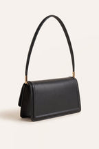 Harriet shoulder bag in black — three-quarter view