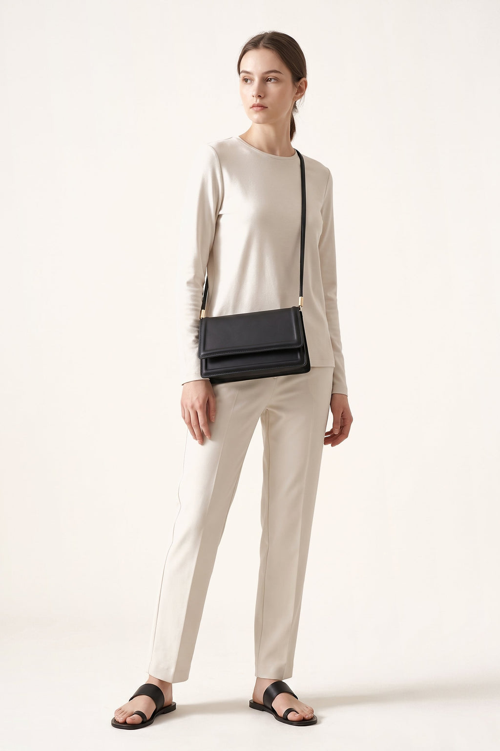 Harriet shoulder bag in black — on model