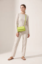 Harriet shoulder bag in green — on model
