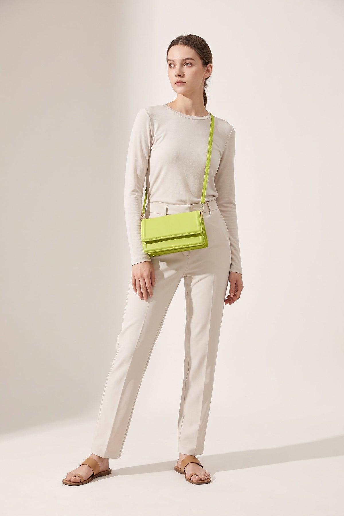Harriet shoulder bag in green — on model
