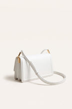 Harriet shoulder bag in white — three-quarter view