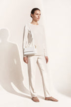 Harriet shoulder bag in white — on model