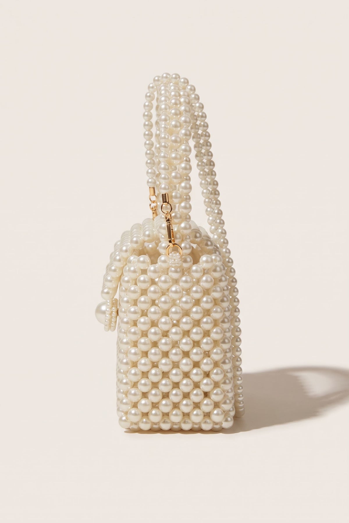 Iris mini bag in ivory — side view
