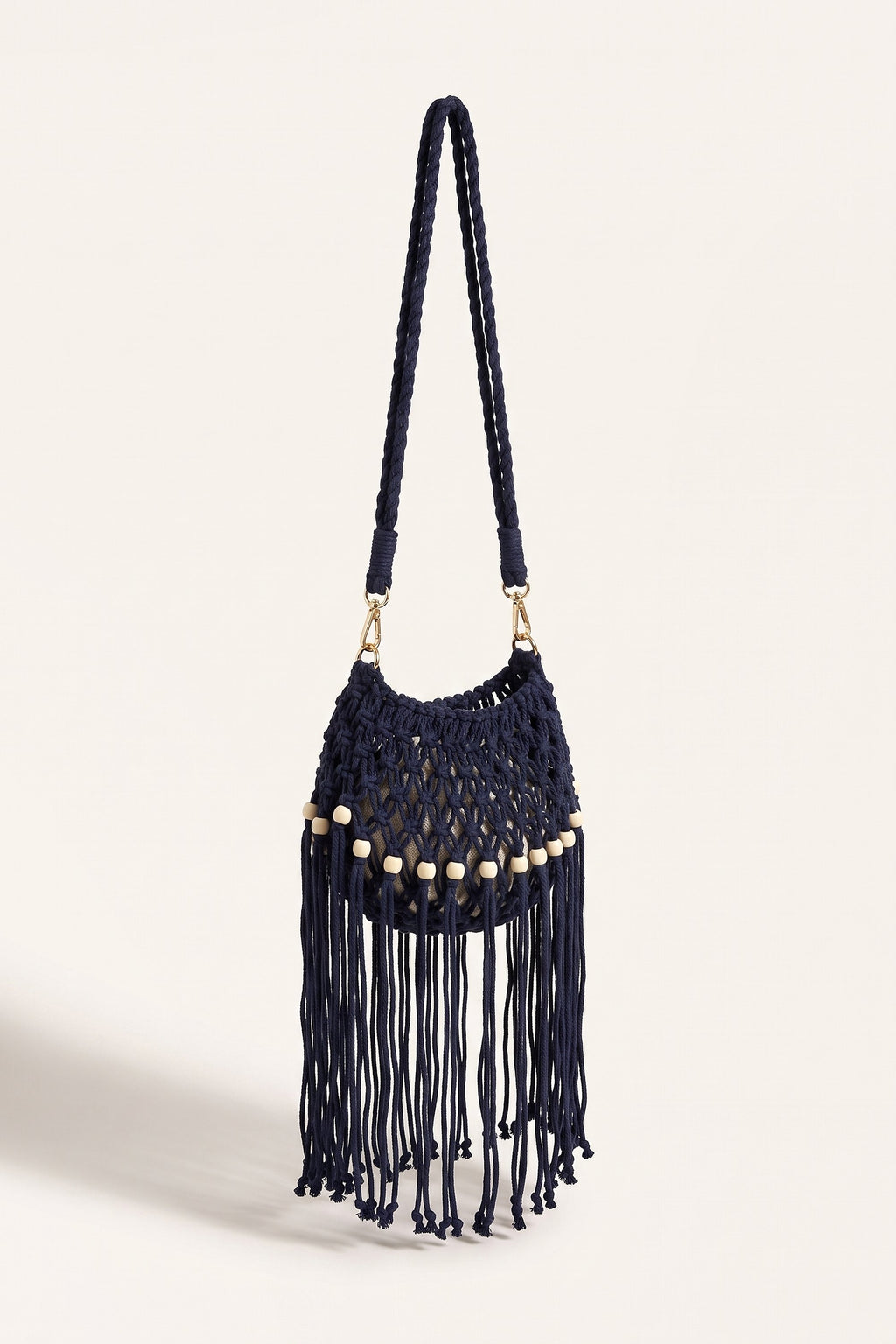 Juniper Shoulder Bag in Black/Navy Blue — three-quarter view