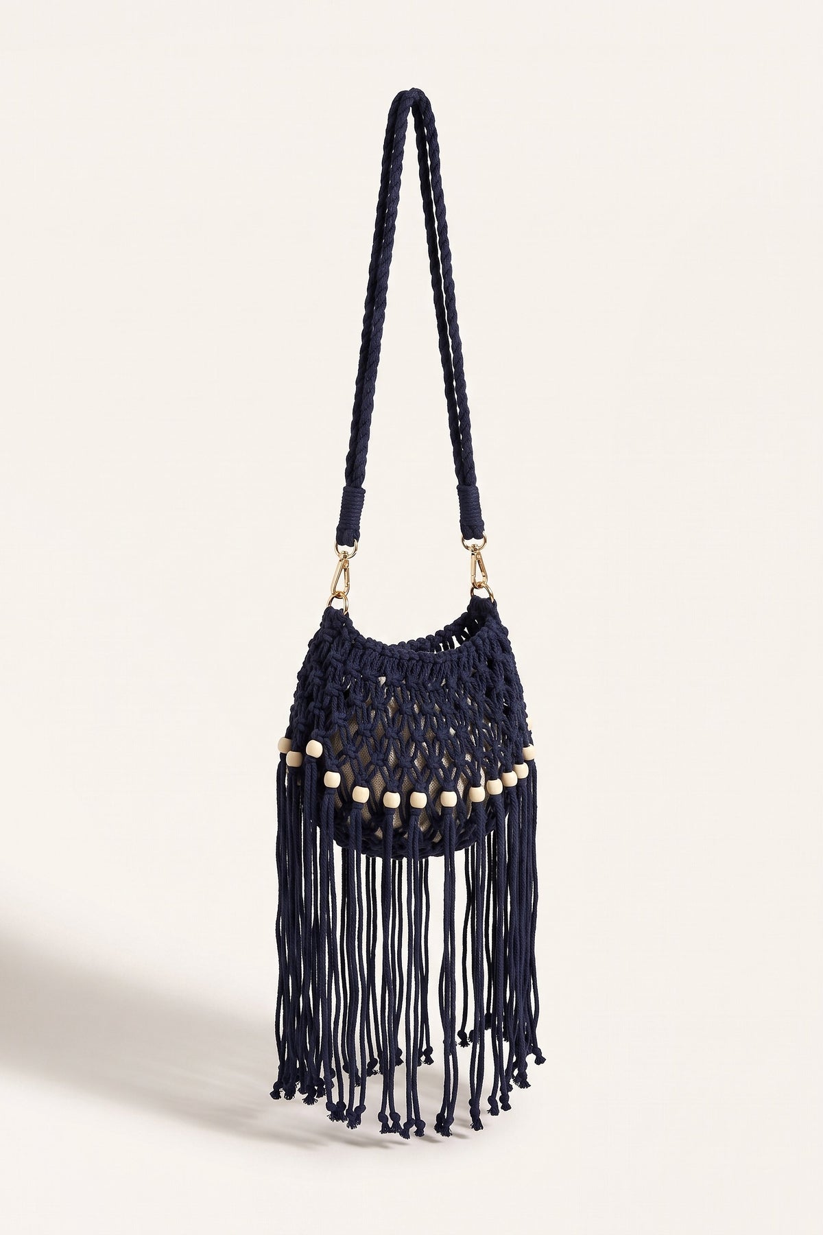 Juniper Shoulder Bag in Black/Navy Blue — three-quarter view