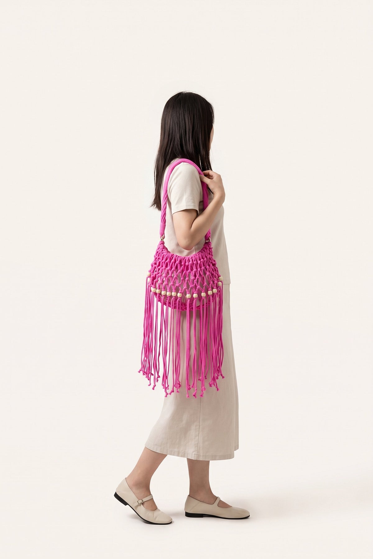 Juniper Shoulder Bag in Pink — on model