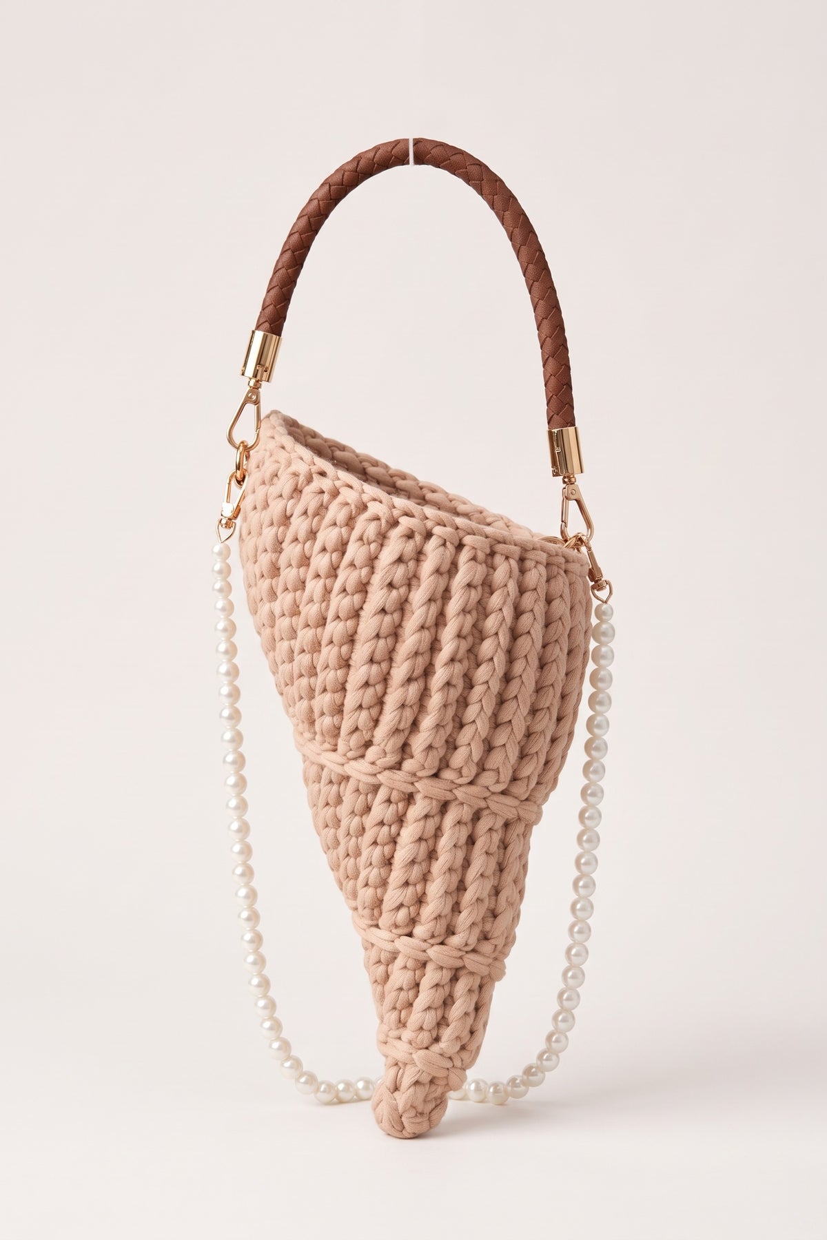 Lucille woven handbag in beige — front view