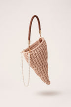 Lucille woven handbag in beige — three-quarter view