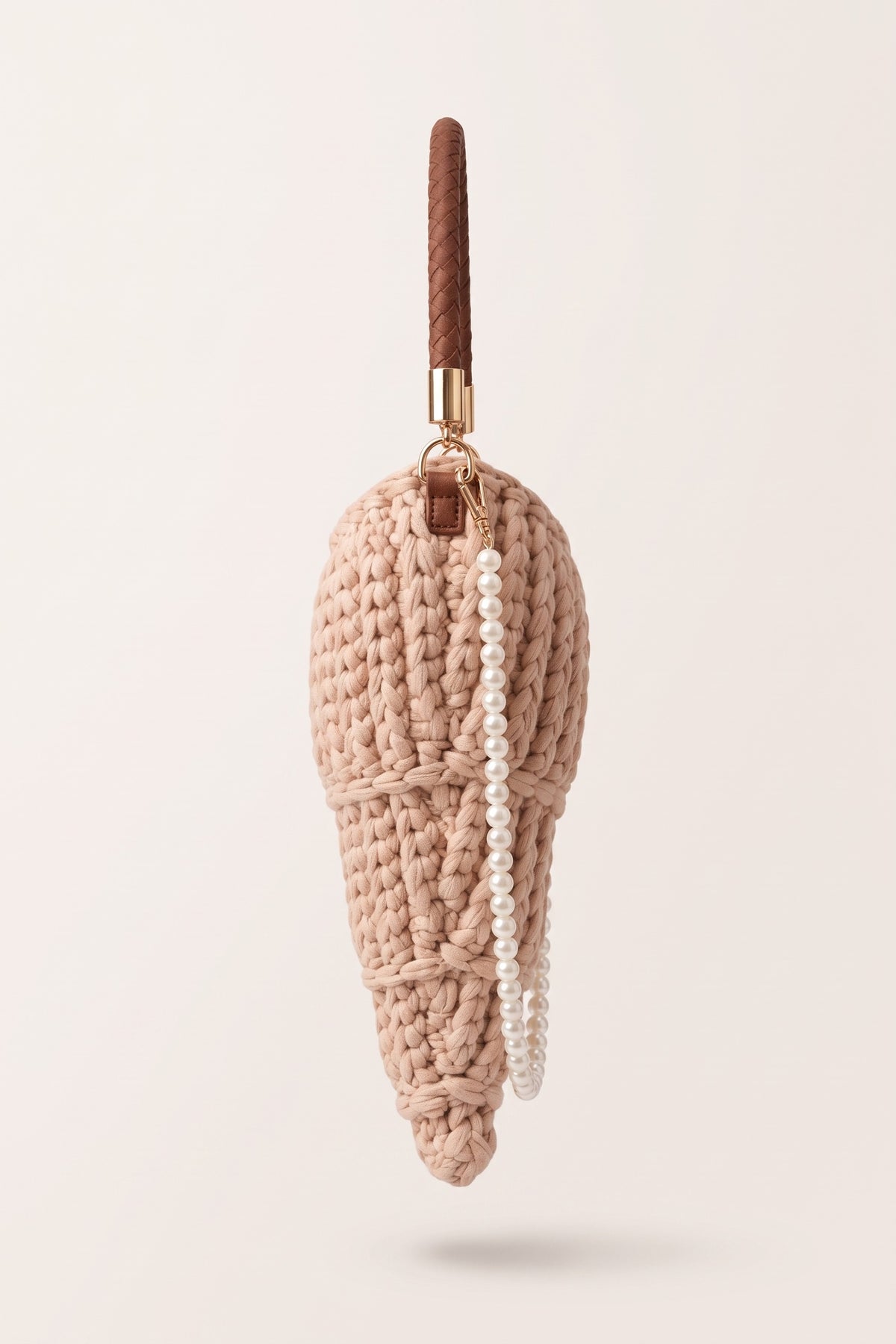 Lucille woven handbag in beige — side view