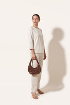 Margot mocha faux-pearl shoulder bag — on model