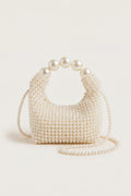 Odette faux-pearl handbag in ivory — front view