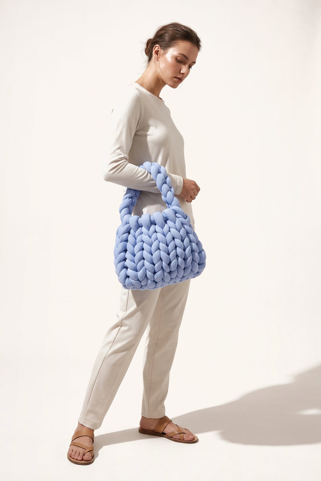 Ottilie tote bag in blue — on model