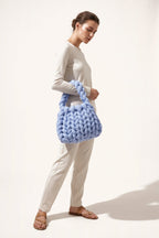 Ottilie tote bag in blue — on model