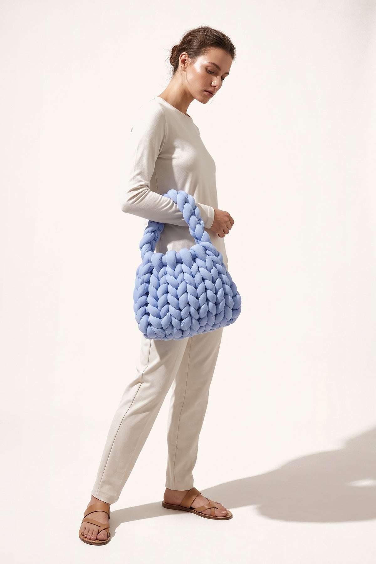 Ottilie tote bag in blue — on model