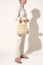 Ottilie tote bag in light yellow — on model