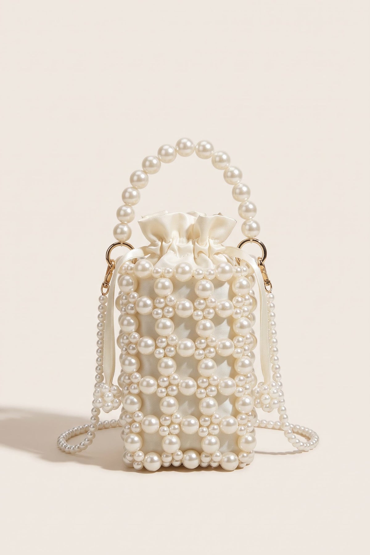 Perla crossbody bag in ivory — front view