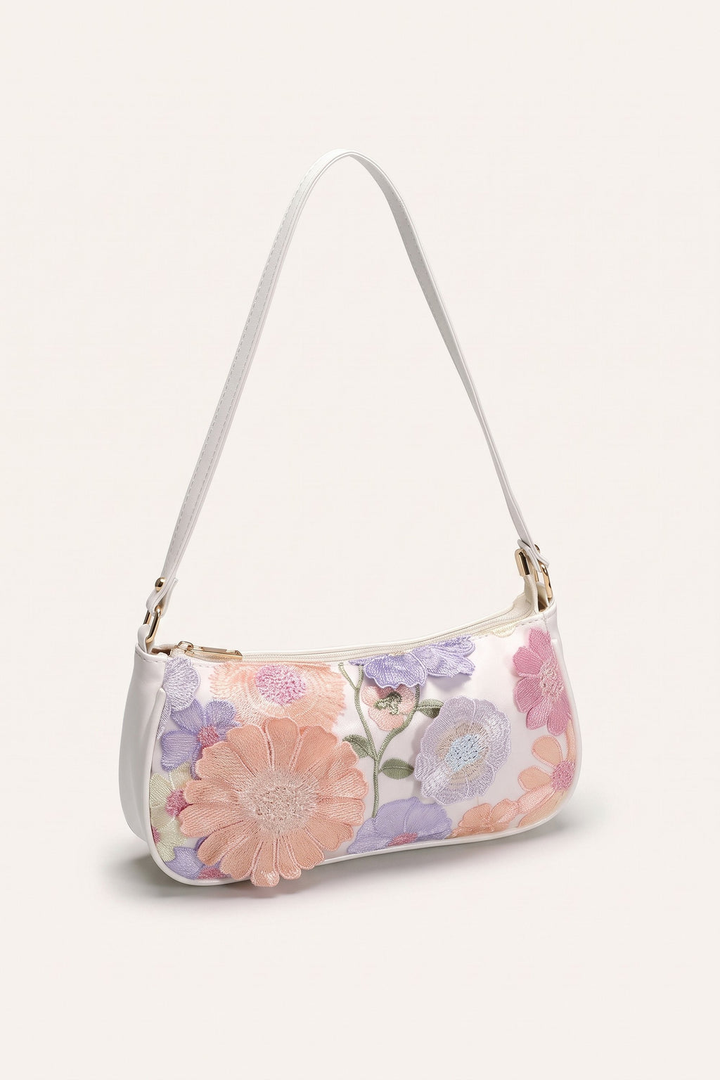 Primrose pastel floral embroidery shoulder bag in white — three-quarter view