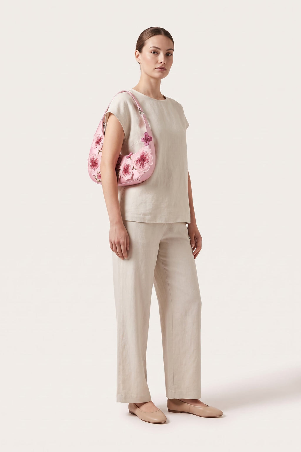 Rosalind blossom embroidery shoulder bag in pink — on model