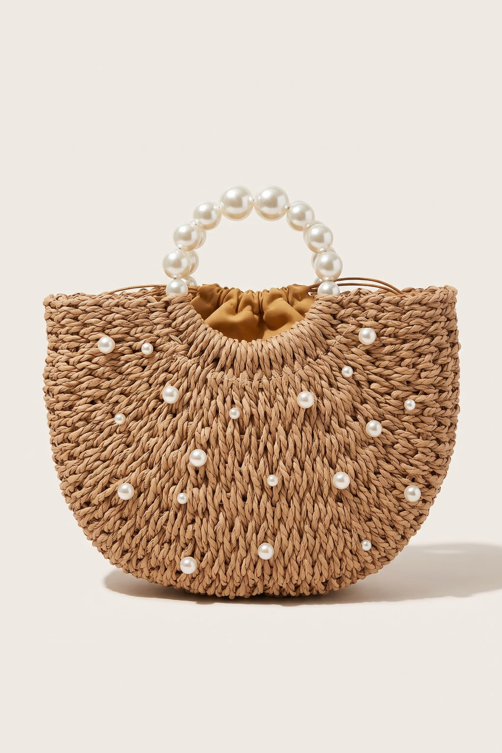 Thea handbag in natural raffia — front view