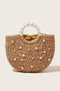 Thea handbag in natural raffia — front view