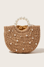 Thea handbag in natural raffia — front view