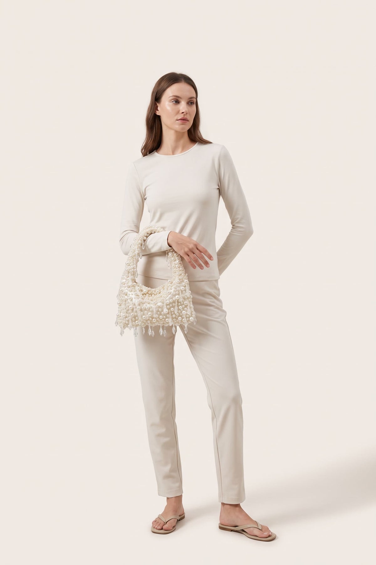 Vivienne handbag in ivory — on model