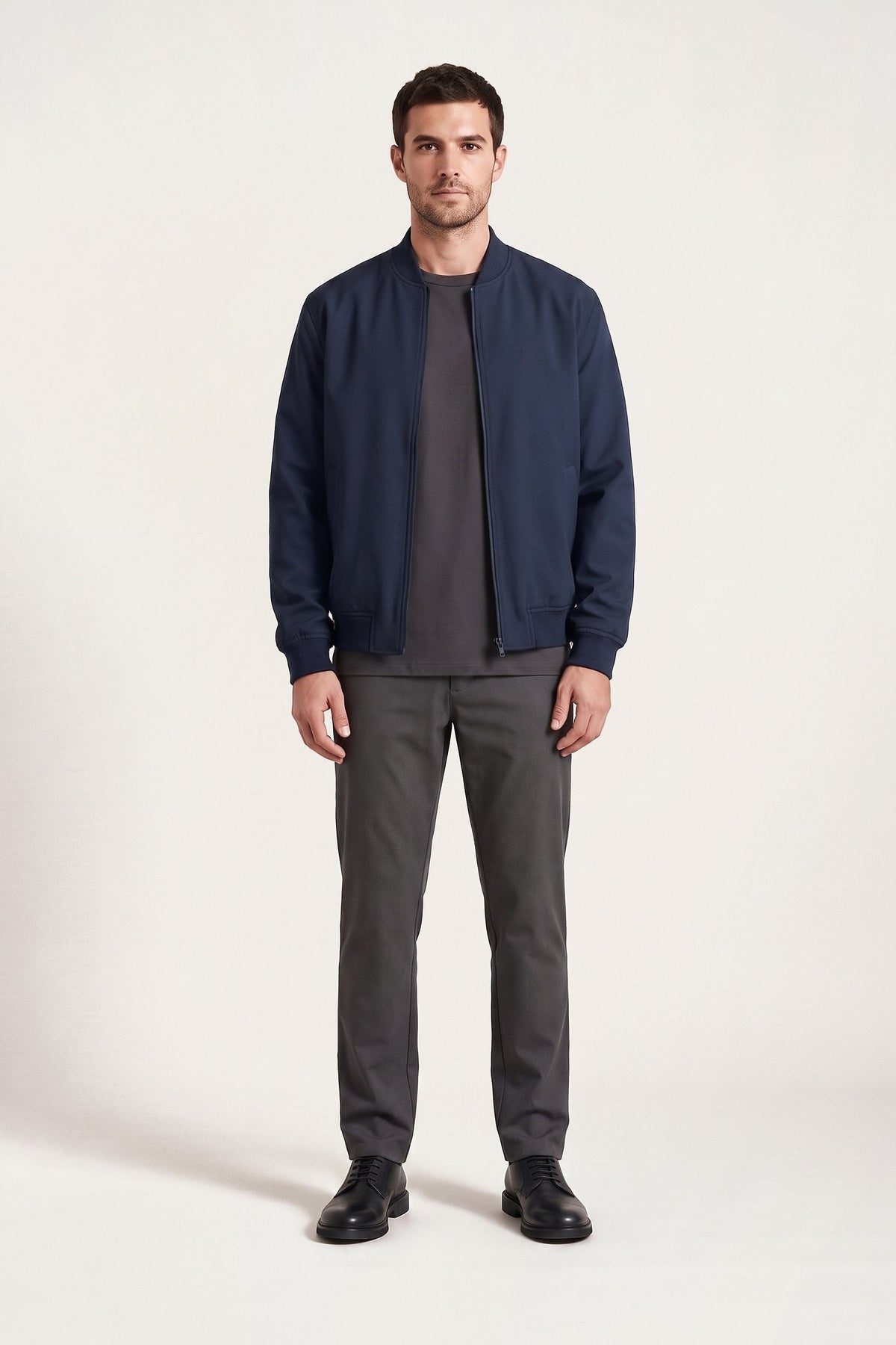 Erling bomber jacket in navy — front view on model