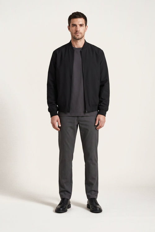 Erling bomber jacket in black — front view on model