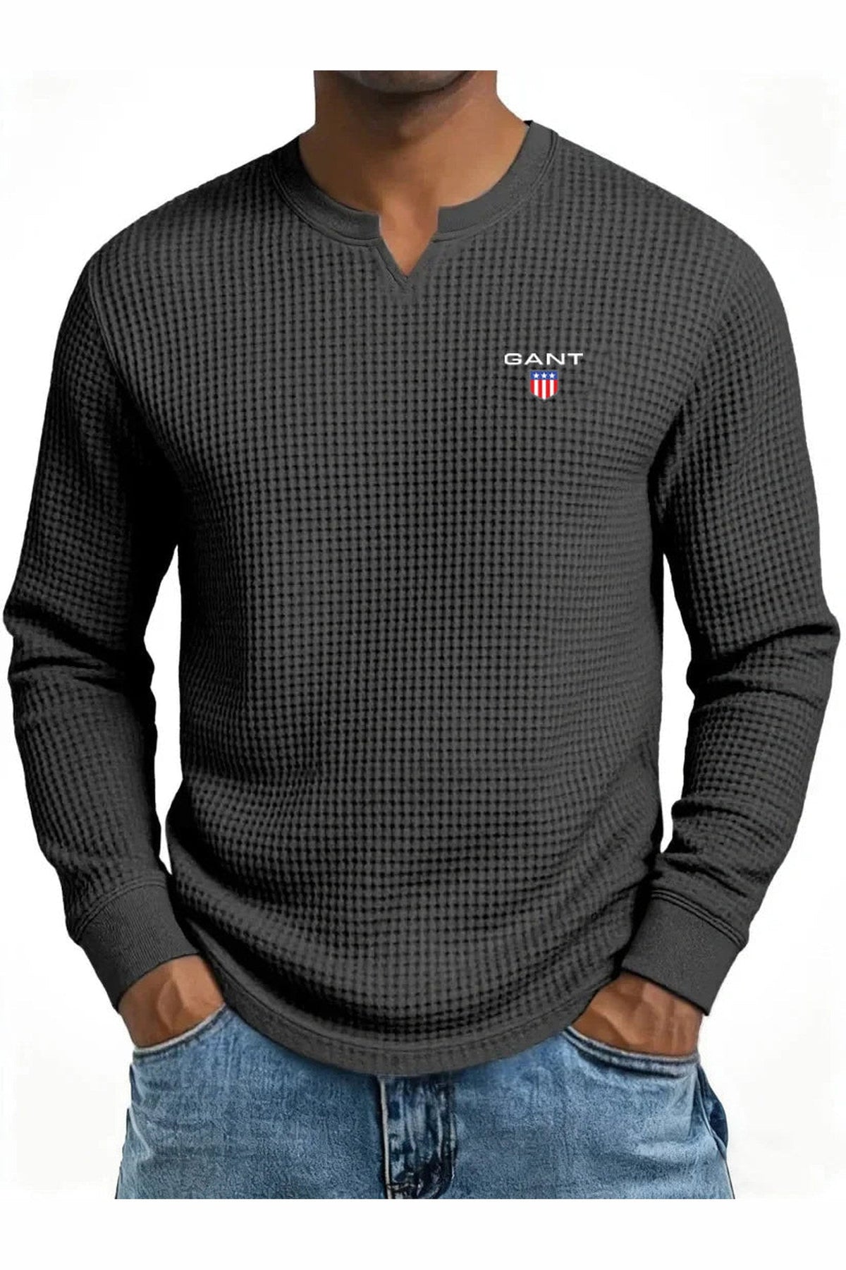 GANT® waffle-knit summer jumper in black — front view on model