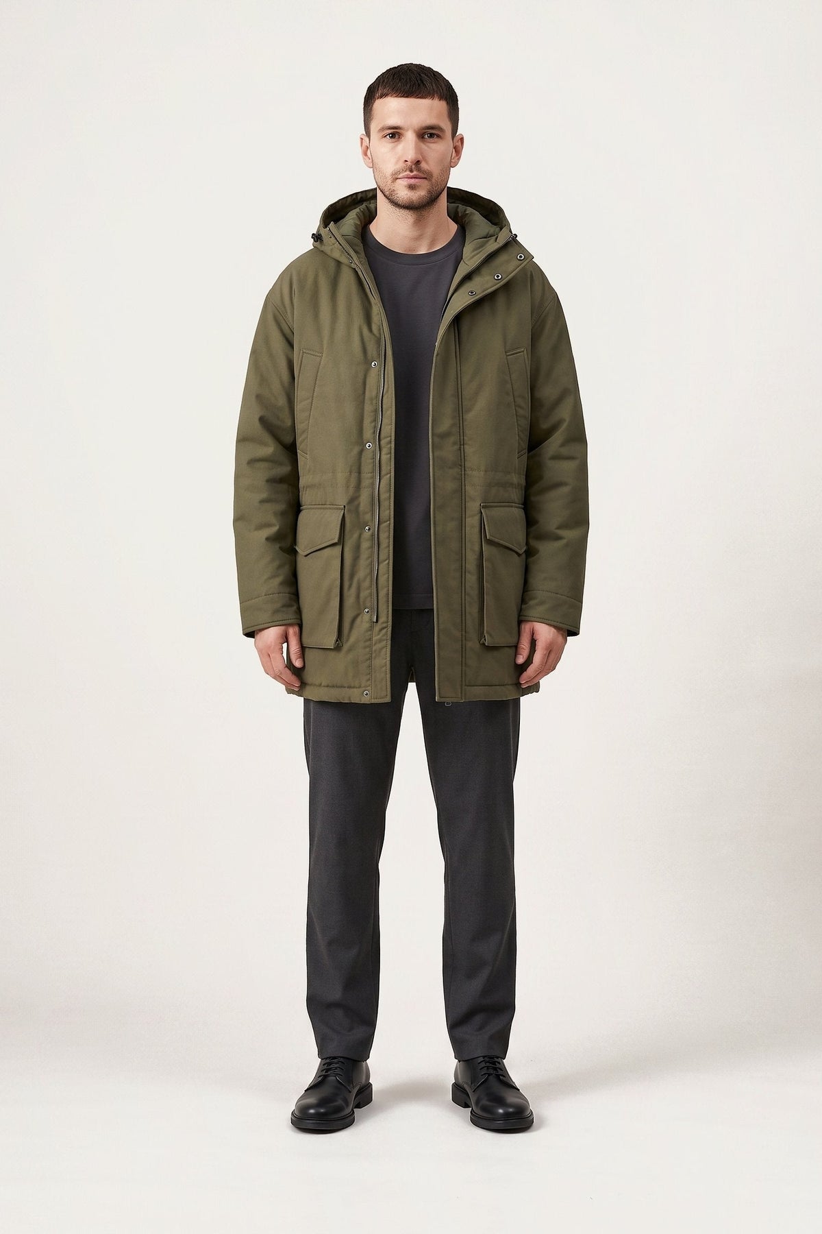 Gustav parka in olive green — front view on model