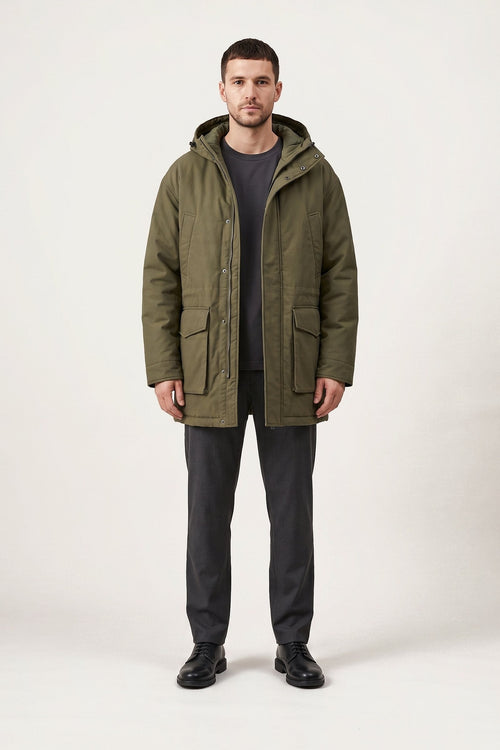 Gustav parka in olive green — front view on model