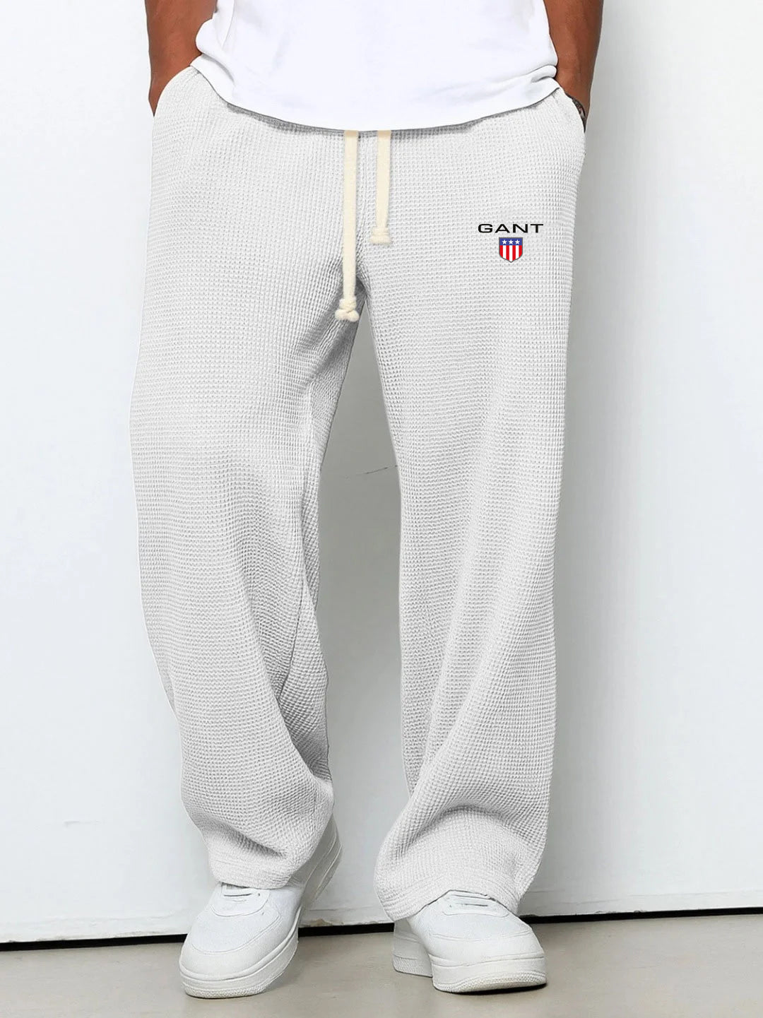 GANT® waffle-knit trousers in white — front view on model