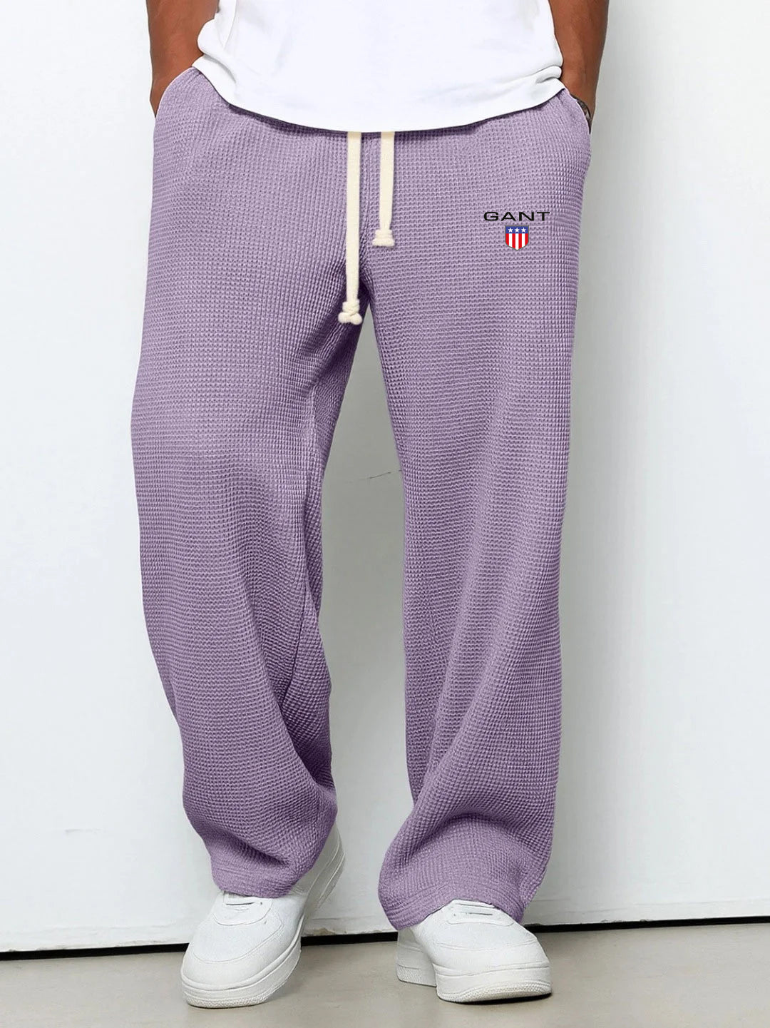 GANT® waffle-knit trousers in orange — front view on model
