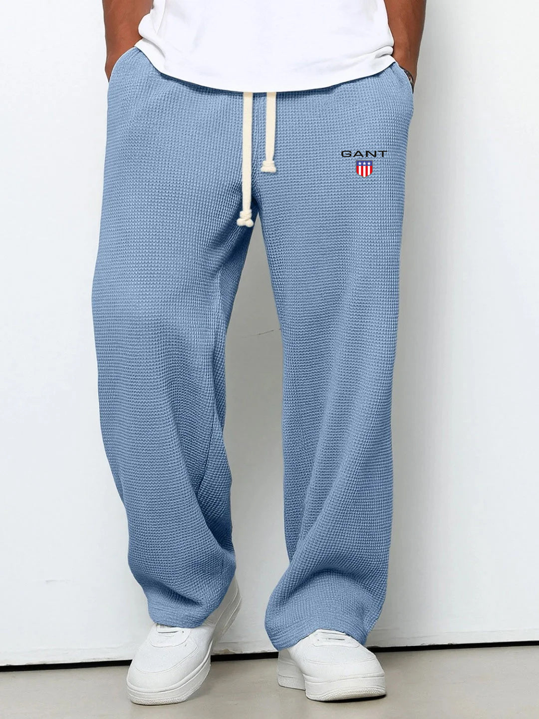 GANT® waffle-knit trousers in light blue — front view on model
