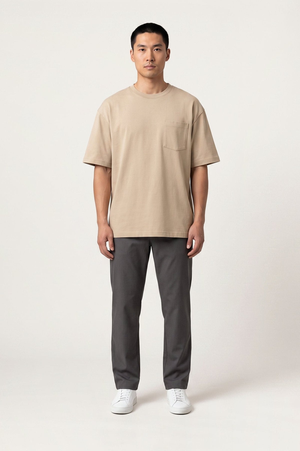 Isak T-shirt in sand — front view on model