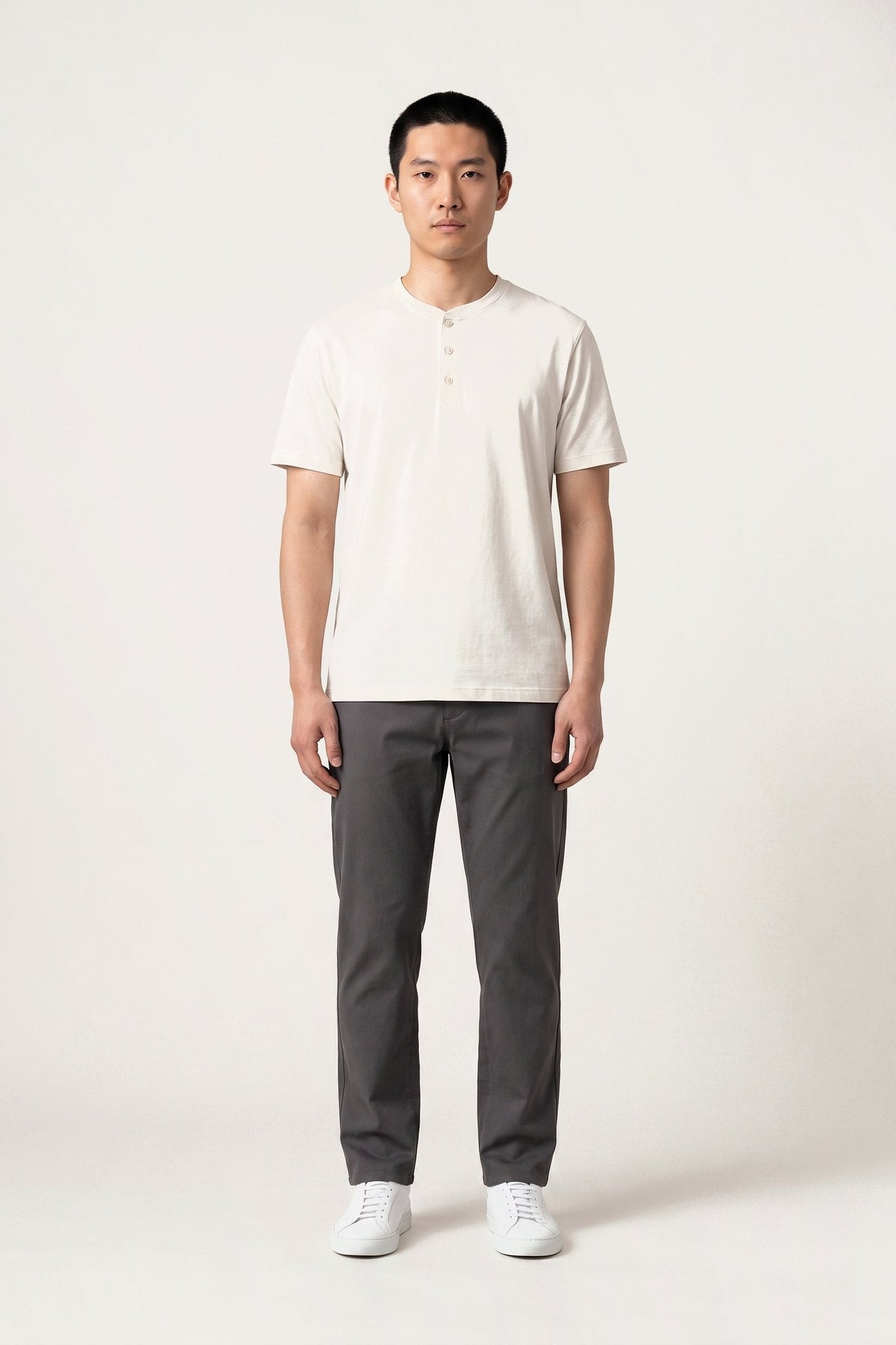 Kalle T-shirt in off-white — front view on model