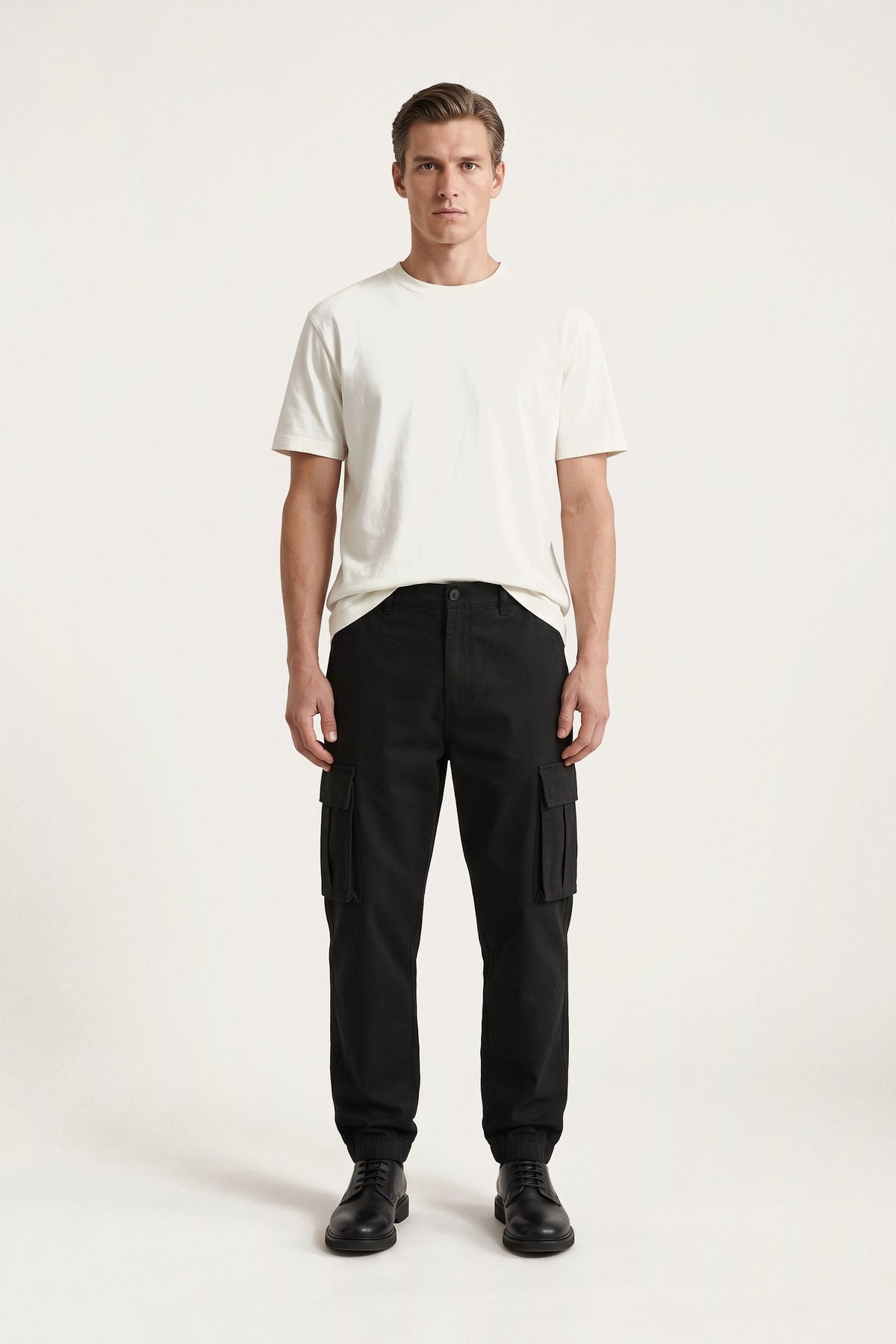 Nils cargo trousers in black — front view